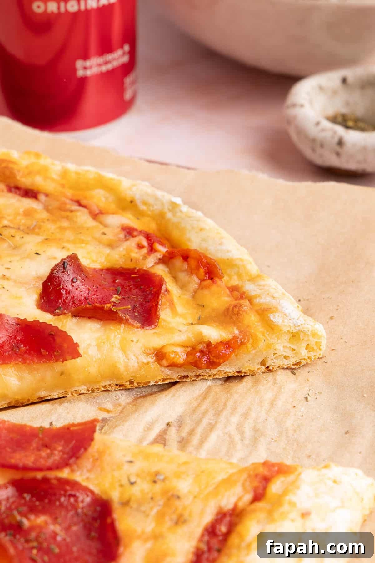 A close up photo of the side of the crust to show the texture of the crust.