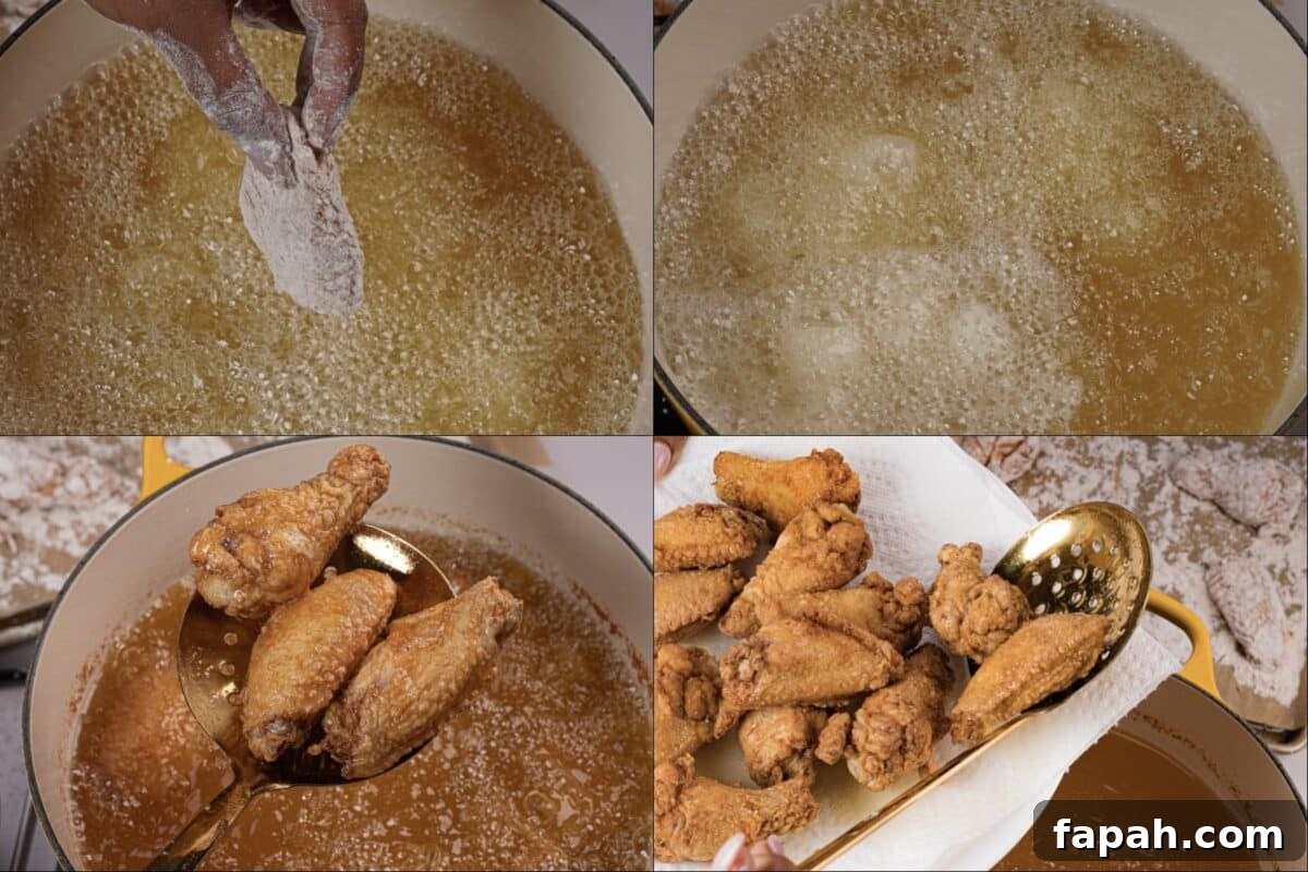 Crispy Lemon Pepper Chicken Wings Recipe 6 Wings frying in oil