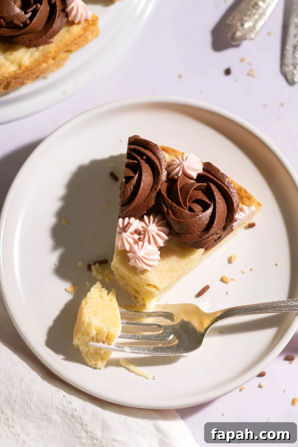 Sugar Cookie Cake Recipe: Soft, Chewy Layer Cake Guide 3 a slice of sugar cookie cake on a plate with a fork