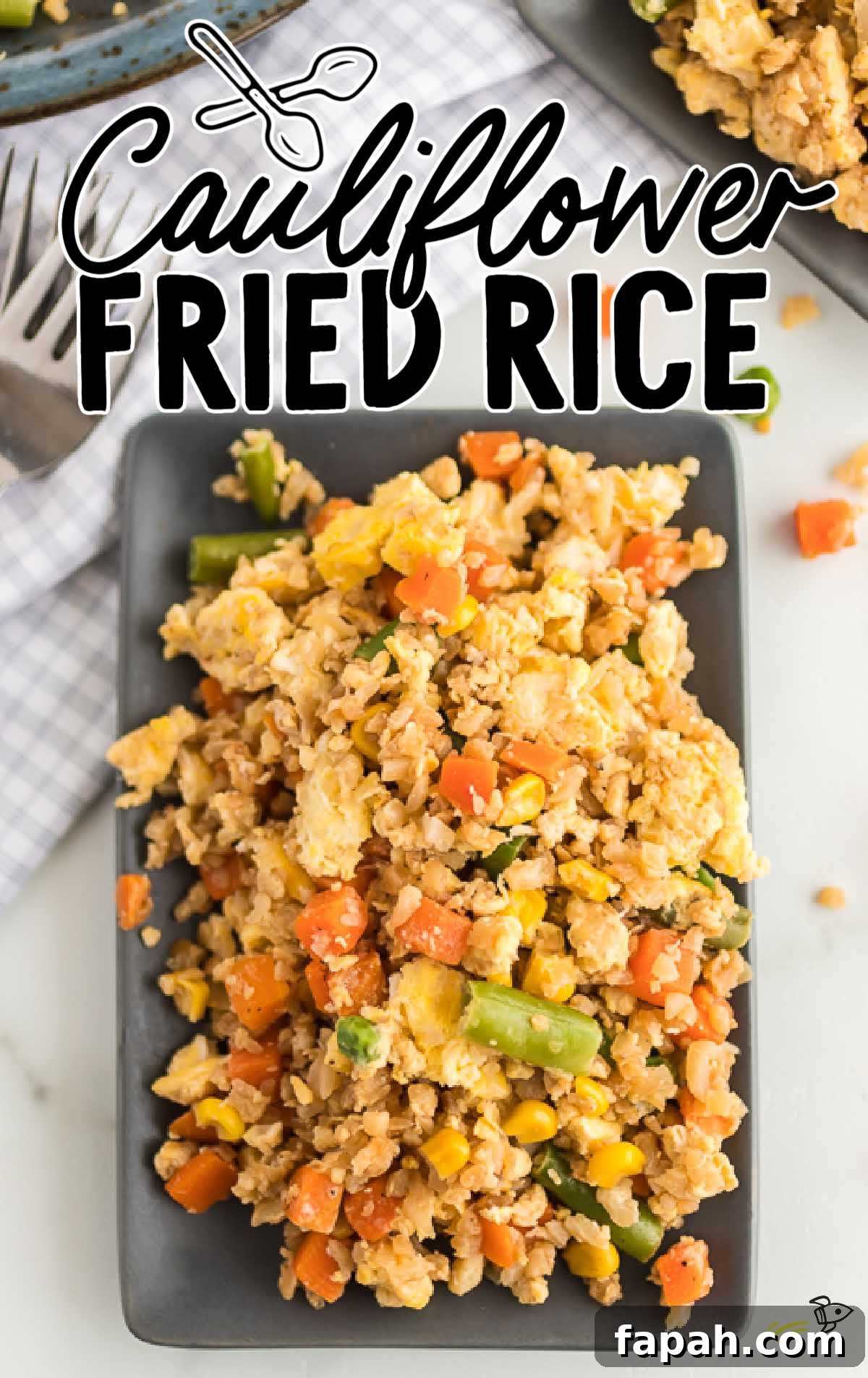 Low-Carb Cauliflower Fried Rice Recipe for Quick Weeknight Meals 2 overhead shot of a plate of Cauliflower Fried Rice