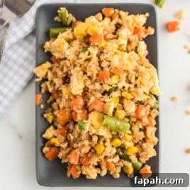 Low-Carb Cauliflower Fried Rice Recipe for Quick Weeknight Meals 11 overhead shot of a plate of Cauliflower Fried Rice