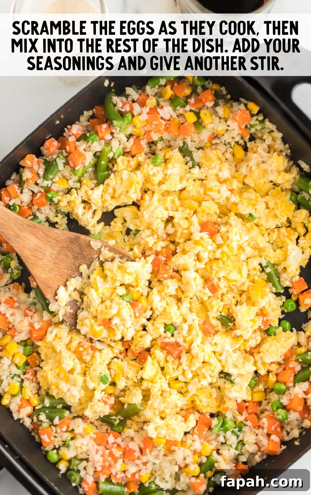 Low-Carb Cauliflower Fried Rice Recipe for Quick Weeknight Meals 5 Cauliflower Fried Rice being cooked in a skillet