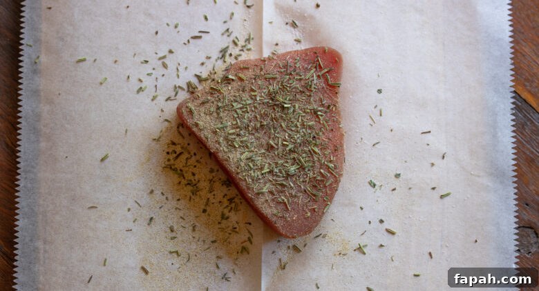 Generously seasoned tuna steak with salt, white pepper and herbes de Provence.