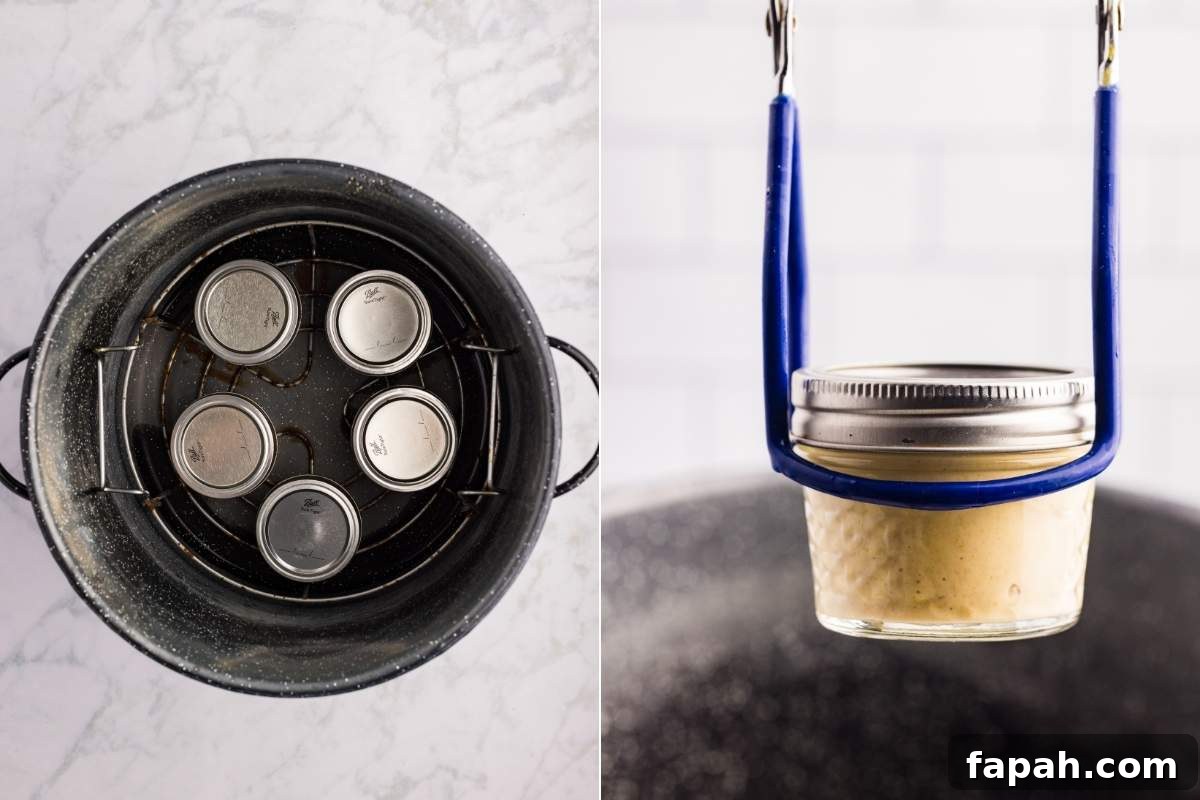 Water bath canner with jars and jar lifter removing finished jar.