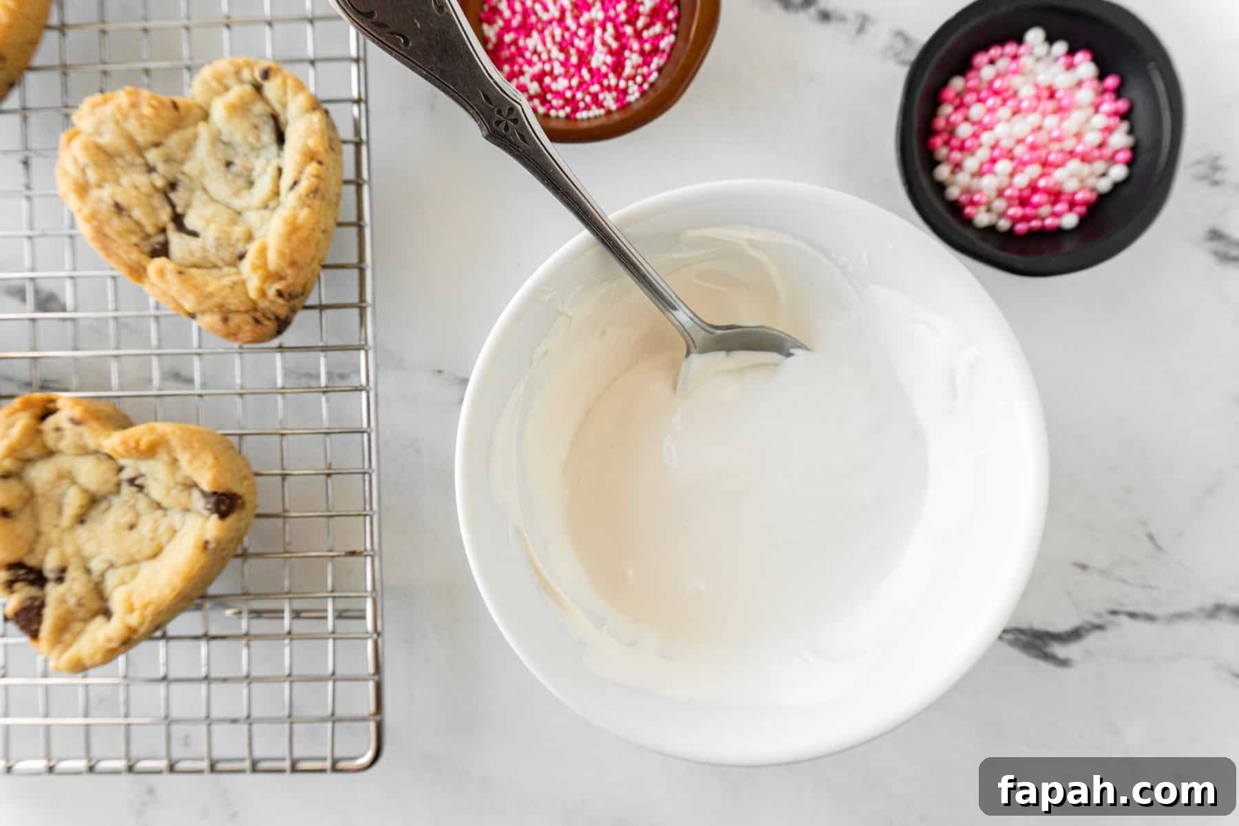 Heart-Shaped Cookies Recipe for Valentine’s Day 10 candy melts melted in bowl.