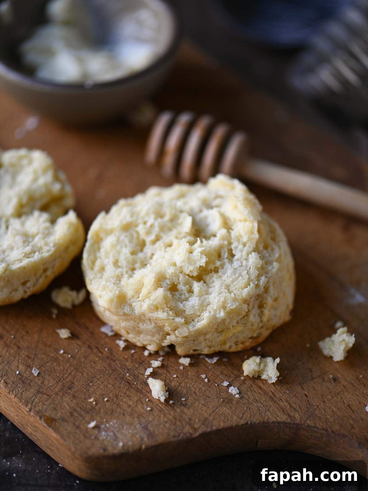 Close-up showing a cut biscuit showing it's fluffy texture.