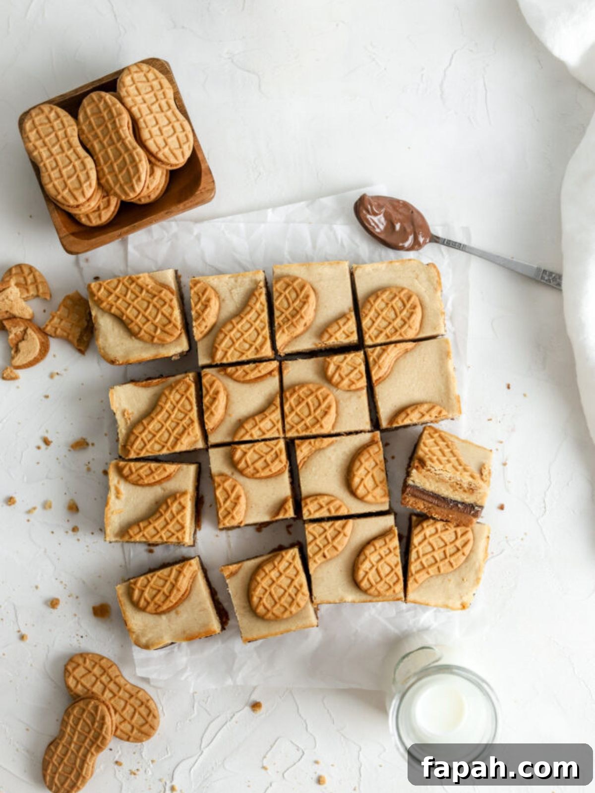 Nutter Butter bar squares, a jug of milk and Nutter Butter cookies. 