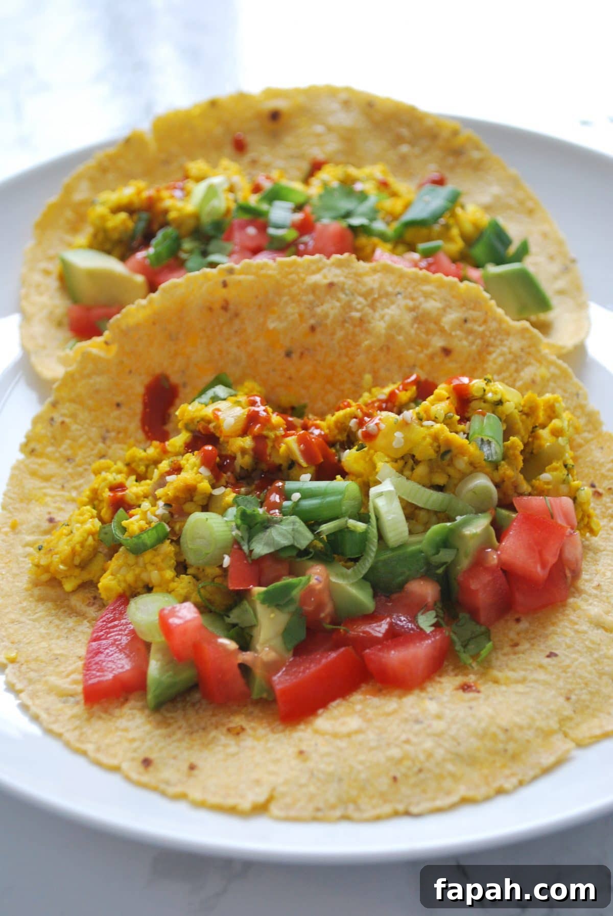 Protein-Packed Scrambled Tofu Breakfast Tacos for Busy Mornings 2 a plate with scrambled tofu tacos