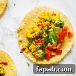 Protein-Packed Scrambled Tofu Breakfast Tacos for Busy Mornings 3 A close up view of a scrambled tofu taco.