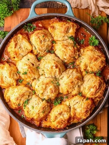Catfish etouffee pot pie in a cast iron skillet.