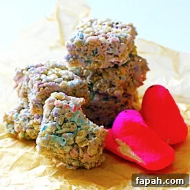 A pile of colorful rice krispie treats made with marshmallow peeps.