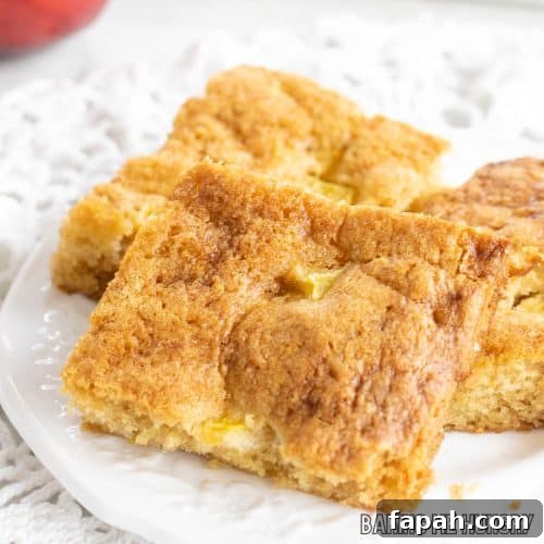 peach blondies recipe close up on a small white plate