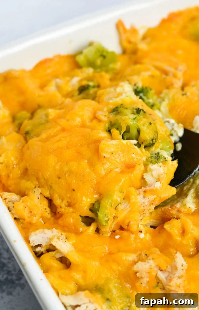 Keto Cheesy Chicken & Broccoli Casserole with Cauliflower Rice 3 This Cheesy Cauliflower Rice with Broccoli and Chicken Casserole is the perfect keto dinner with just 8 net carbs per serving!