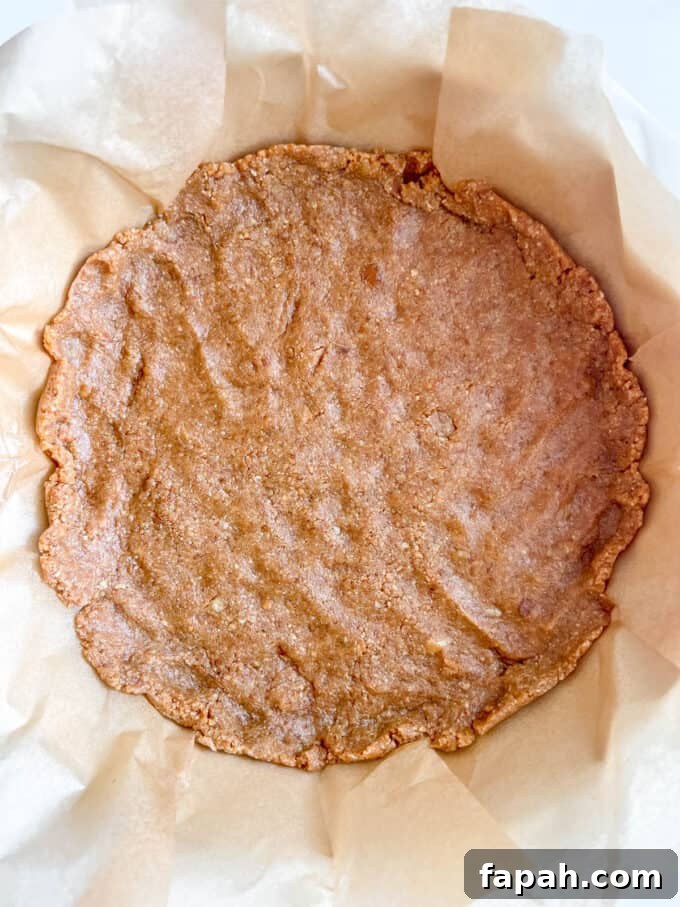 Pumpkin Cheesecake with Gingersnap Graham Cracker Crust Recipe 5 Cheesecake pie crust in pan.