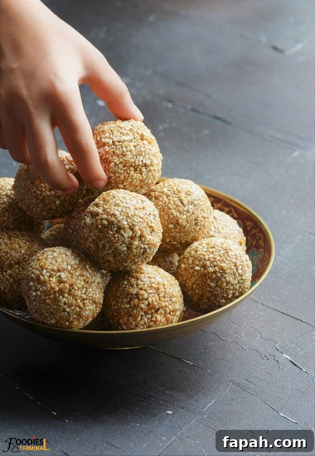 Sesame Ladoo Recipe: Traditional Til Laddu for Festivals 12 Til laddu sankranti special indian sweet in a bowl