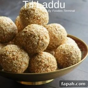 Sesame Ladoo Recipe: Traditional Til Laddu for Festivals 13 Til Laddu stacked in a pile made