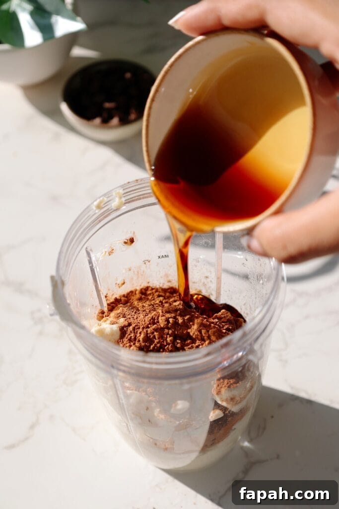 chocolate tofu pudding  step two - pouring all of the ingredients into the blender
