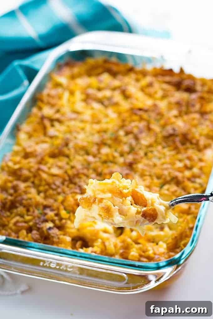 cheesy hashbrown casserole with corn flake topping