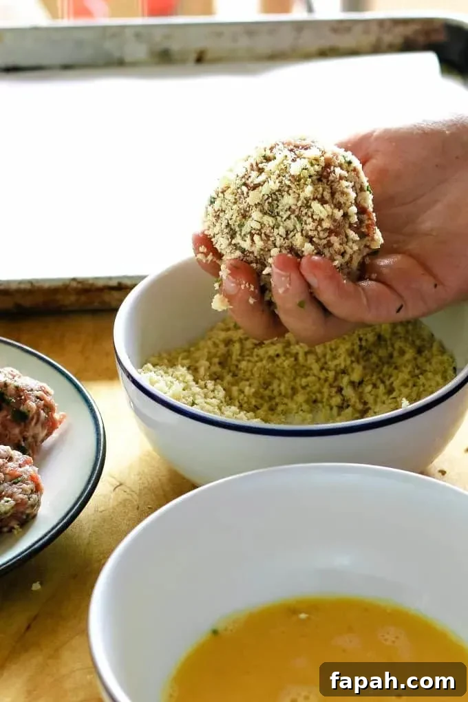 scotch egg rolled in bread crumbs