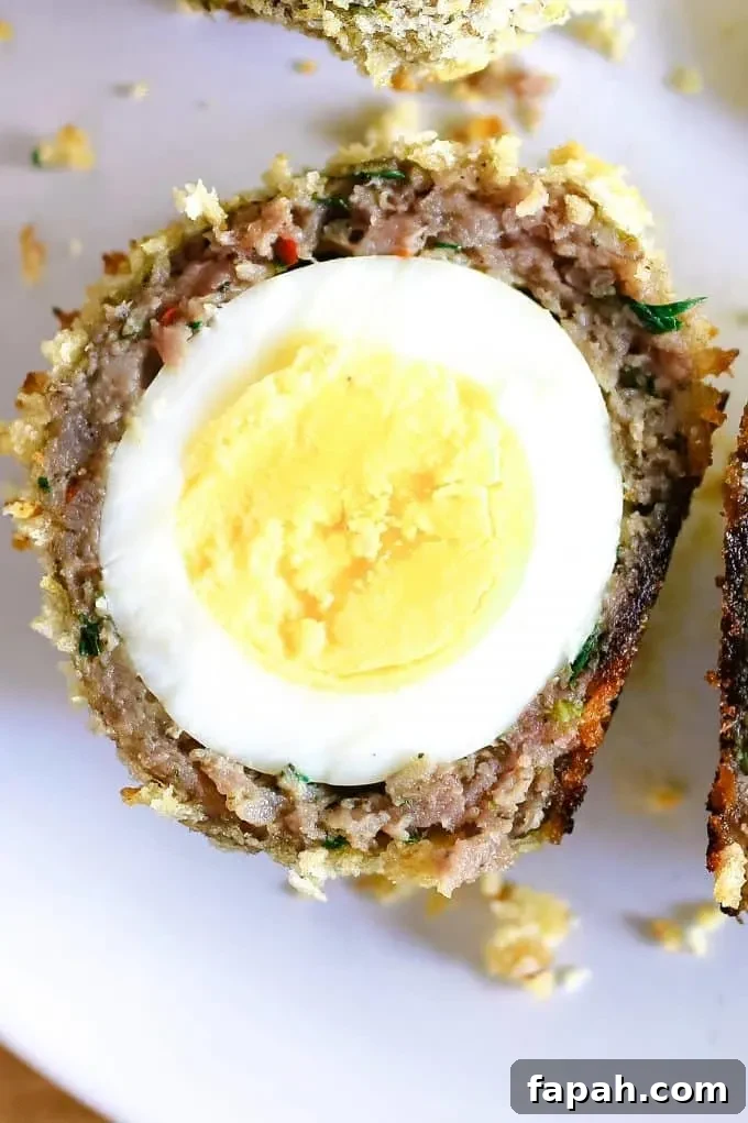 up close photo of cut open baked scotch eggs