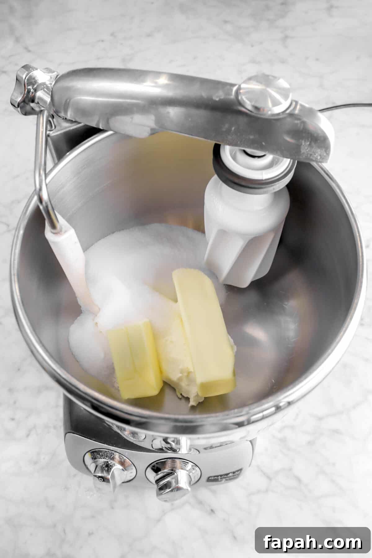 butter, cream cheese, and sugar in mixer