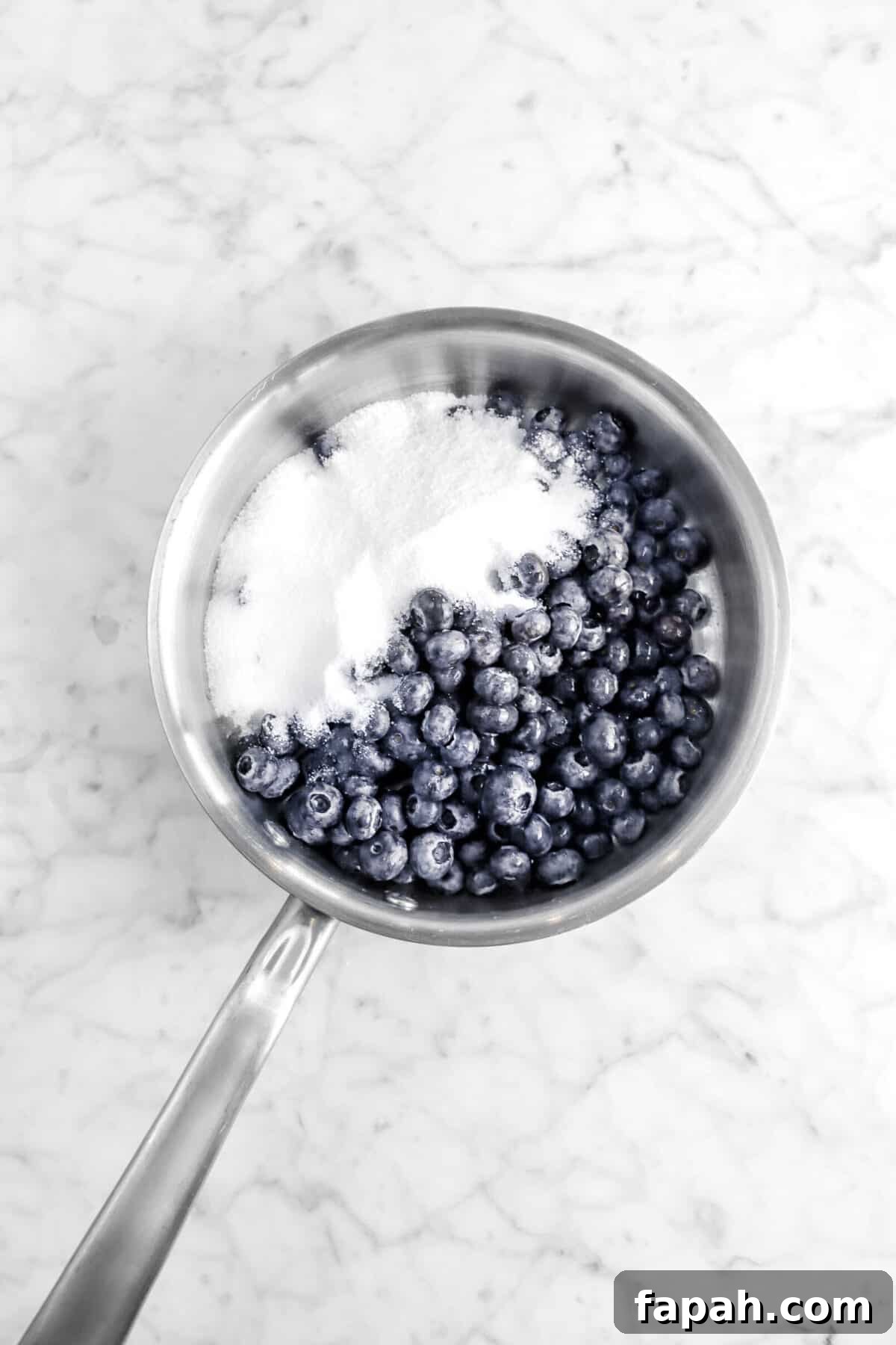 blueberries, lemon juice, and sugar in small pot