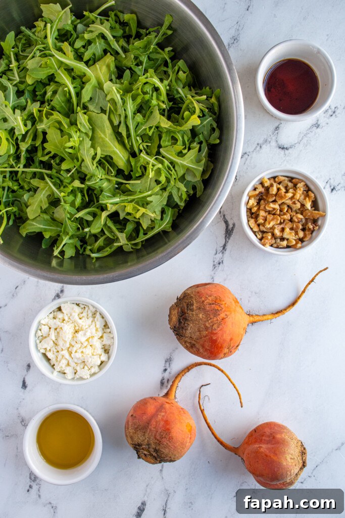 Arugula & Roasted Golden Beet Salad with Citrus Vinaigrette 4 Overhead view of ingredients needed to make golden beet and arugula salad.