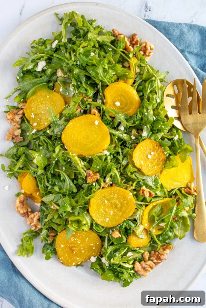 Arugula & Roasted Golden Beet Salad with Citrus Vinaigrette 7 A platter of arugula tossed with feta, walnuts, and golden beets.