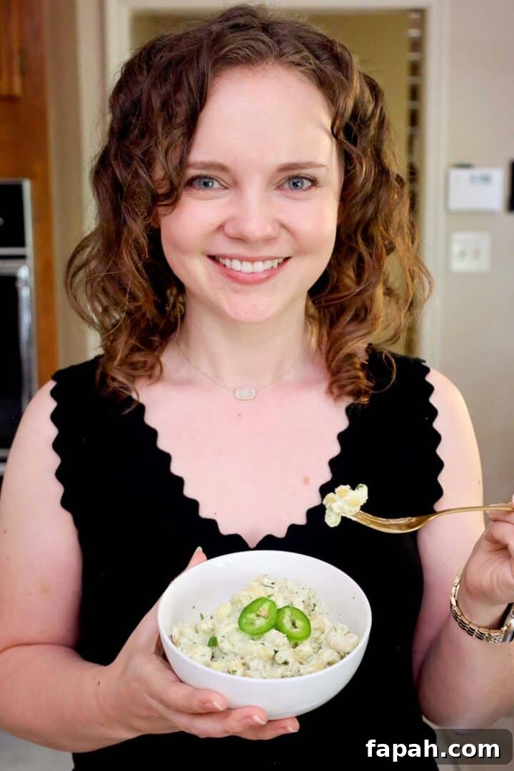 Creamy Jalapeño Ranch Pasta Recipe for a Flavorful Weeknight Meal 13 Kelsey Smith holding a bowl of creamy jalapeño ranch pasta.
