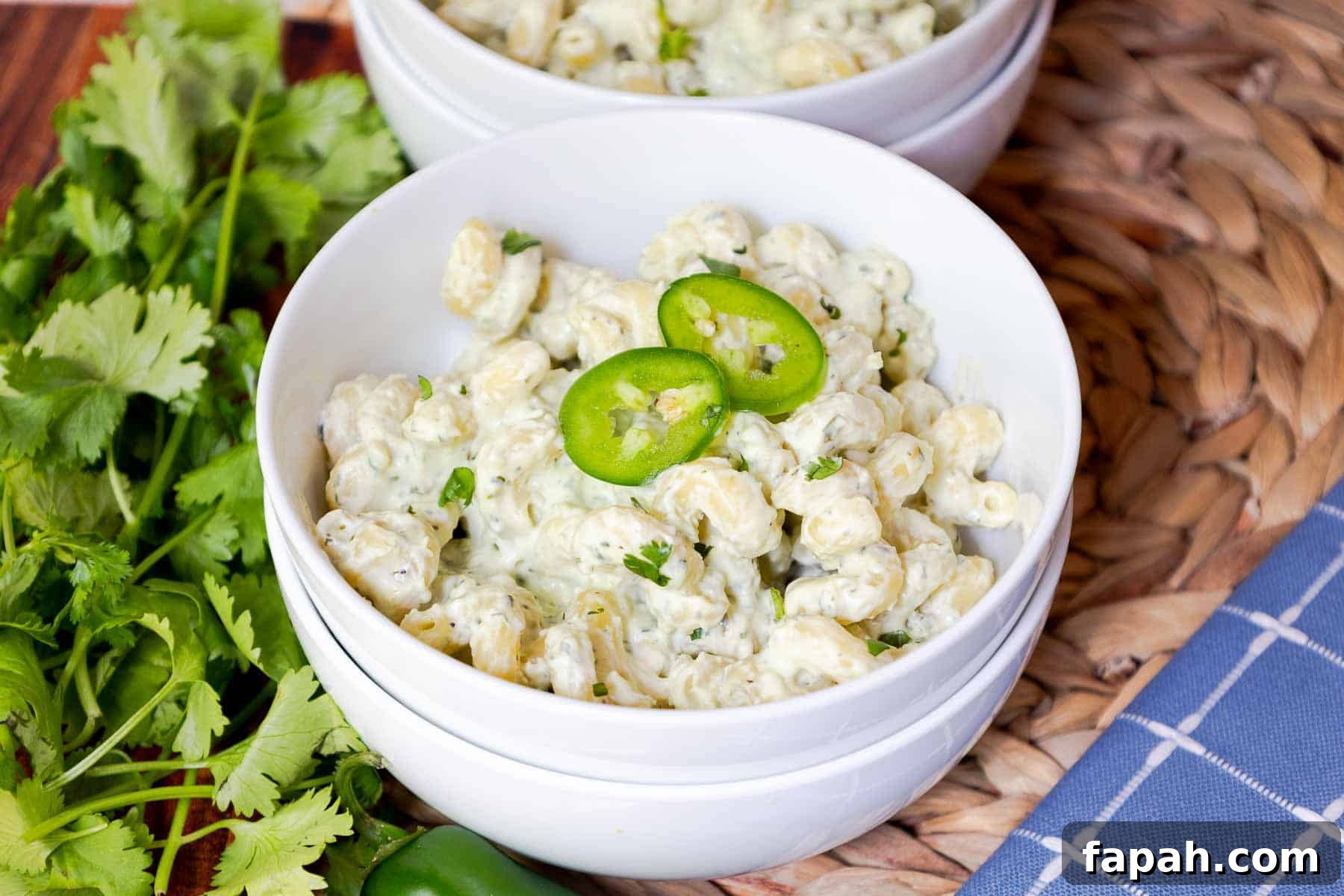 Creamy Jalapeño Ranch Pasta Recipe for a Flavorful Weeknight Meal 14 Two bowls of creamy pasta topped with sliced jalapeños.