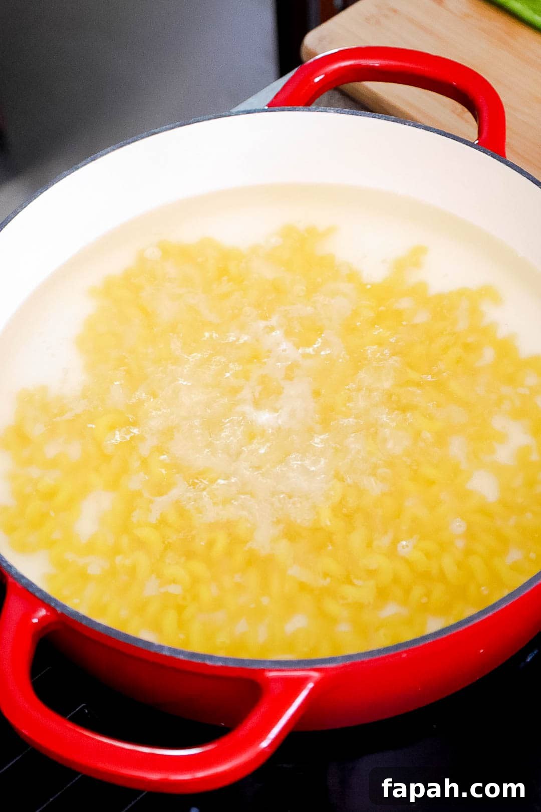 Creamy Jalapeño Ranch Pasta Recipe for a Flavorful Weeknight Meal 4 Pasta boiling in water in a large pot.