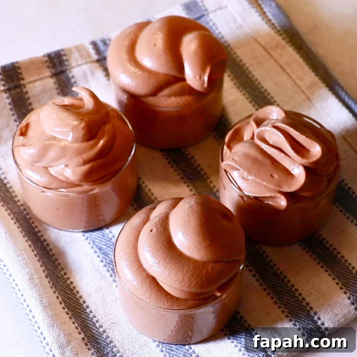 Decadent Chocolate Mousse Recipe for Silky, Airy Dessert 5 chocolate mousse in glass cups