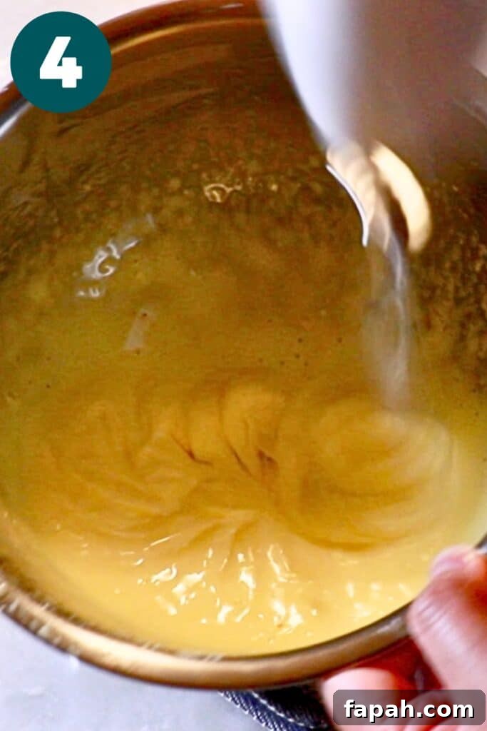 Decadent Chocolate Mousse Recipe for Silky, Airy Dessert 10 whipping the yolk mixture with a hand mixer