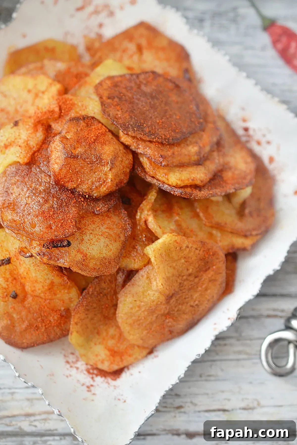 A plate of fried potatoes and onions.