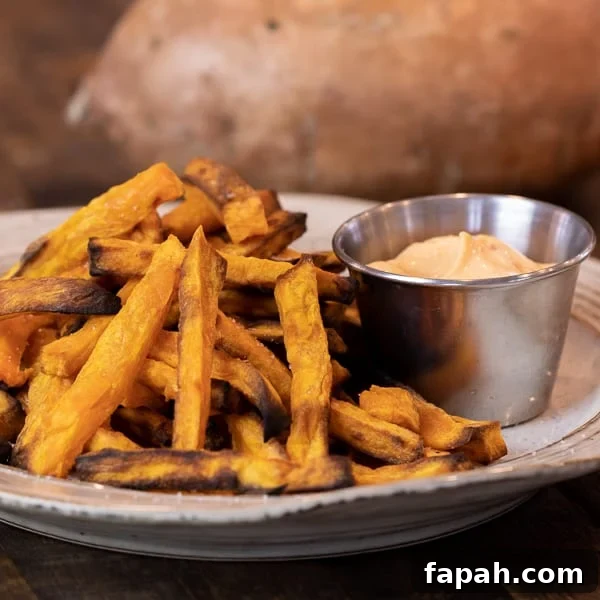 Easy instructions for how to make sweet potato french fries in an air fryer. Crispy and tastes just like deep fried but this recipe uses very little oil. Sweet potatoes make the perfect fries.
