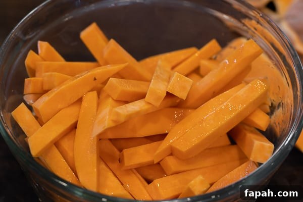 Air Fryer Sweet Potato Fries Recipe - Easy instructions for how to make sweet potato french fries in an air fryer. Crispy and tastes just like deep fried but this recipe uses very little oil. Sweet potatoes make the perfect fries.