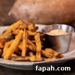 Easy instructions for how to make sweet potato french fries in an air fryer. Crispy and tastes just like deep fried but this recipe uses very little oil. Sweet potatoes make the perfect fries.