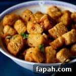 15 Creative Recipes for Using Leftover Bread 11 Closeup view of Bread Upma in a white bowl
