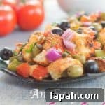 15 Creative Recipes for Using Leftover Bread 12 Bread pieces, red onion, olives and capers on a plate
