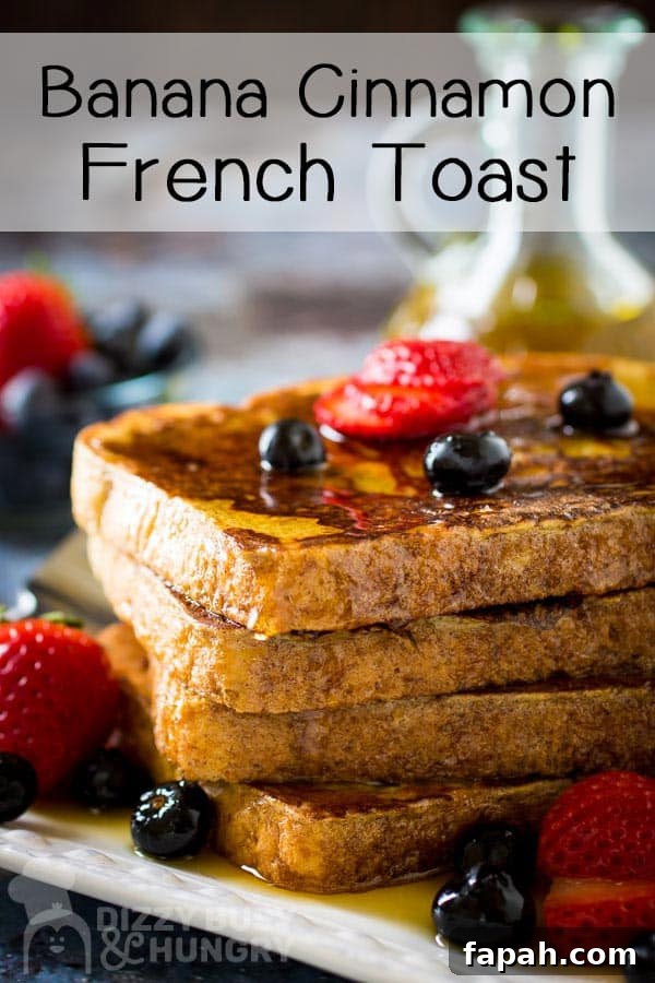 15 Creative Recipes for Using Leftover Bread 14 side view of french toast with syrup and garnished with strawberries and blueberries