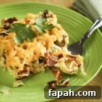 15 Creative Recipes for Using Leftover Bread 9 Side shot of a slice of breakfast casserole on a green plate