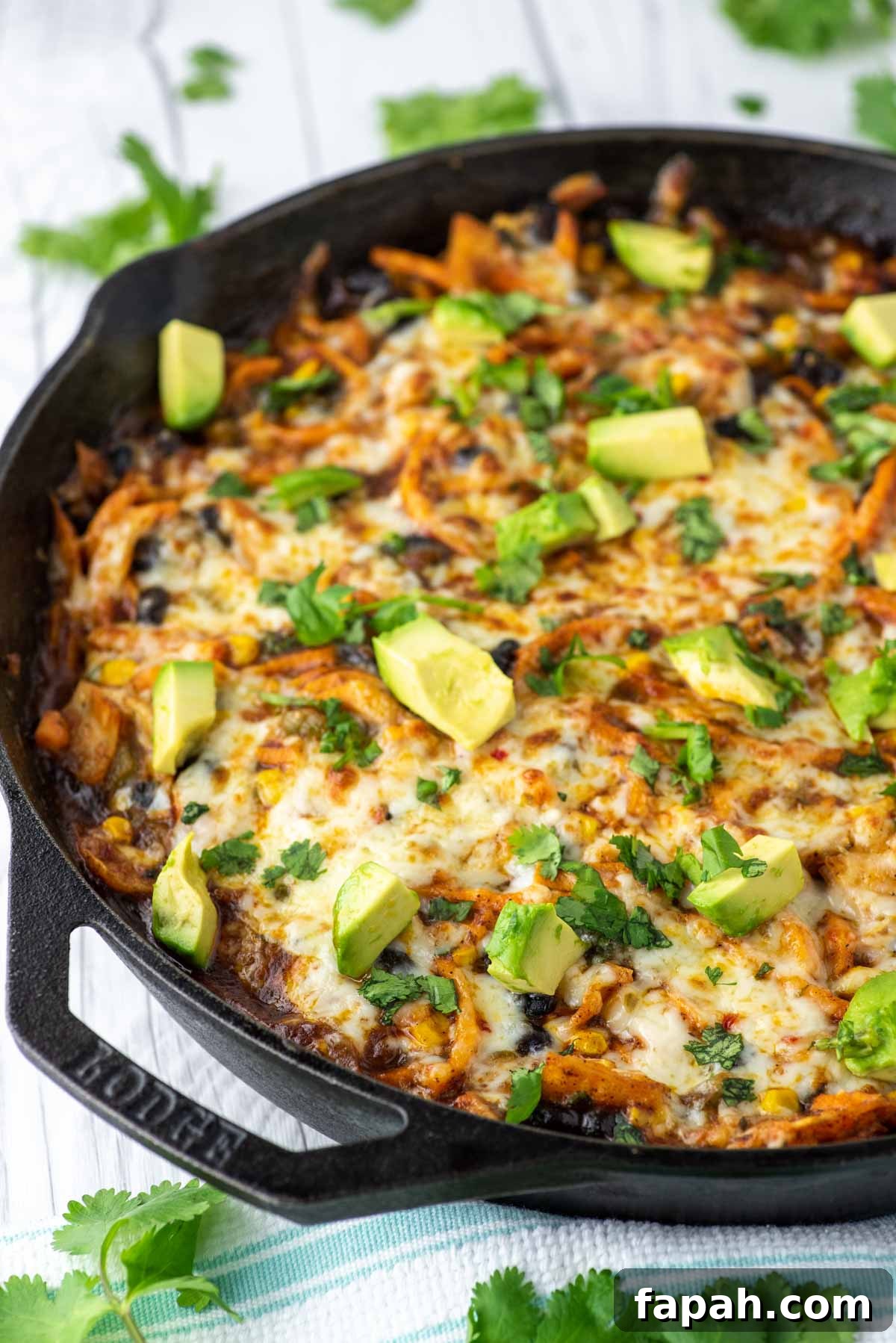 spiralized sweet potato enchilada skillet on dish towel