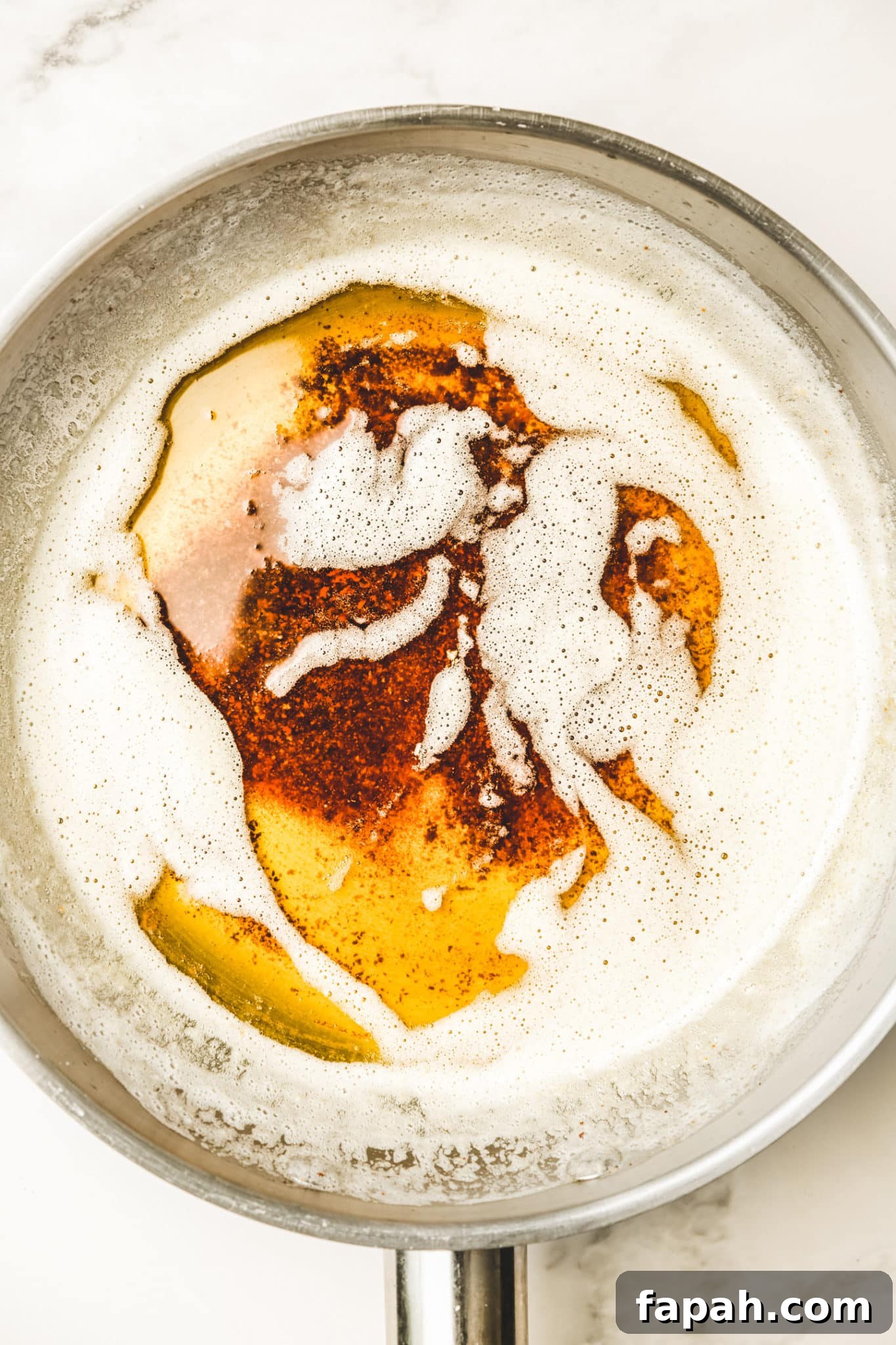 saucepan with melted brown butter beurre noisette
