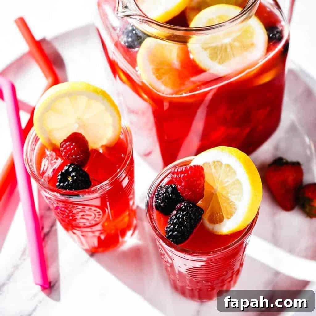 Berry Lemonade in pitcher on tray