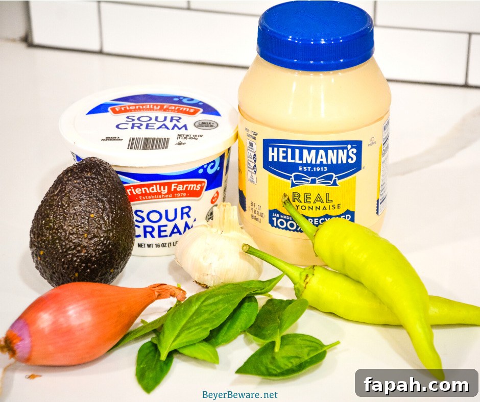 Avocado garlic aioli is a simple aioli made in the food processor with avocado, basil, mayonnaise, garlic, shallots, and lemon juice.