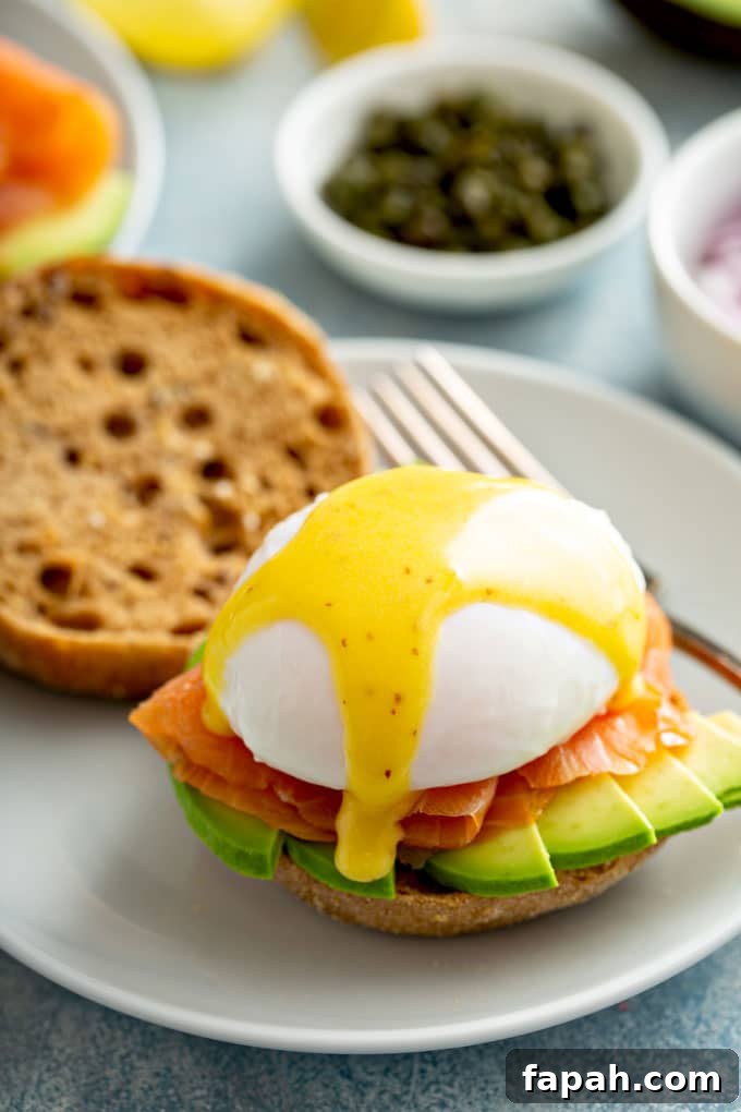 Eggs Benedict with smoked salmon, Hollandaise and avocado