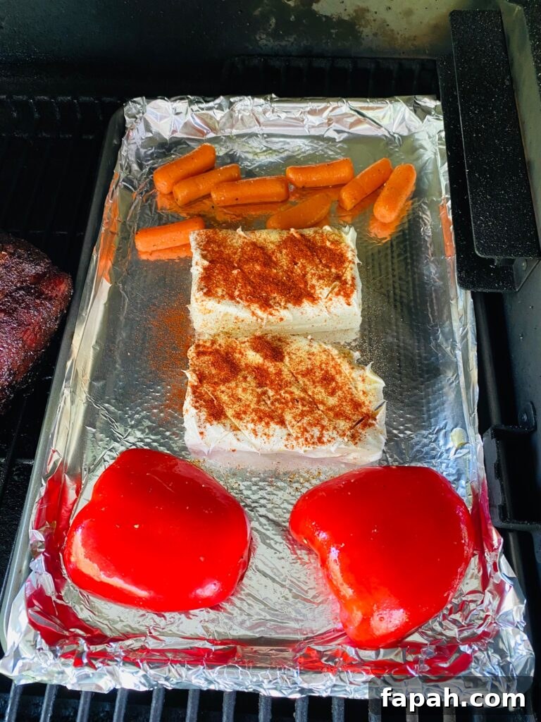 veggies and cream cheese on a tray before cooking