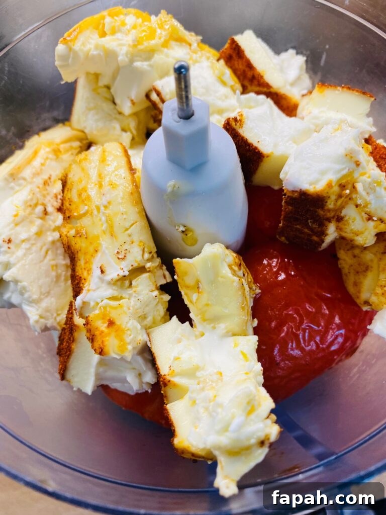 blending the cream cheese in a food processor