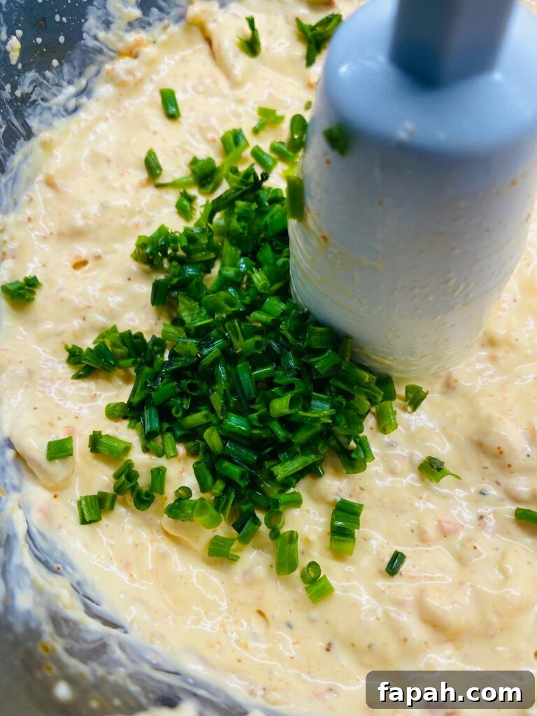 adding chives to Smoked Veggie Cream Cheese