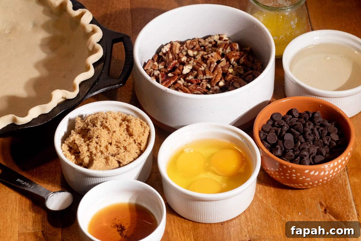 Chocolate Chip and Pecan Pie Recipe: Chocolate-Pecan Pie Guide 4 Ingredients for chocolate chip pecan pie including pecans, chocolate chips, eggs, brown sugar, butter, and pie crust.